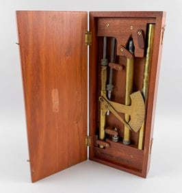 CASED BRASS COMPRESSION AND TENSION SCALE 20th Century Case height 2.5". Width 16". Depth 6.5".