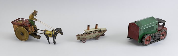 THREE TIN TOYS 20th Century Lengths from 6" to 9.5".