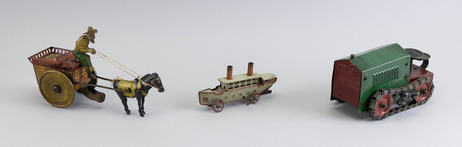 THREE TIN TOYS 20th Century Lengths from 6" to 9.5". (1 of 2)