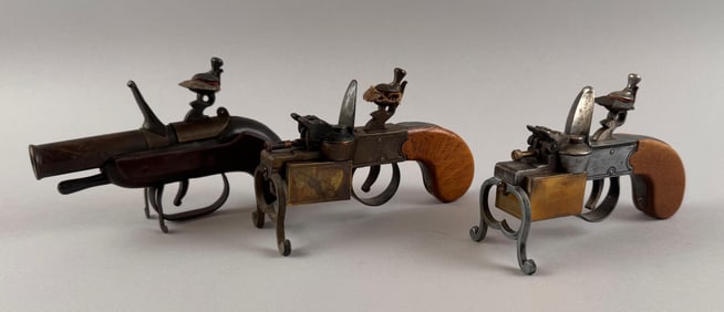 THREE TINDERBOX-STYLE LIGHTERS 20th Century Heights approx. 3.75". Lengths approx. 6".