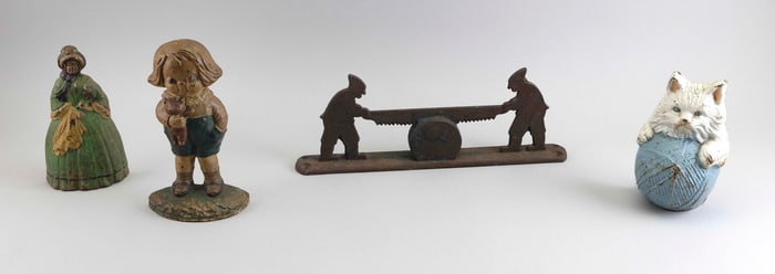FOUR CAST IRON DOORSTOPS 20th Century Heights from 6" to 10".