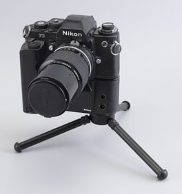 NIKON F3 SLR CAMERA WITH LENS AND ASSEMBLIES Length 7.5".
