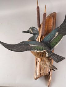 CASEY EDWARDS BLUE-WINGED TEAL CARVING Wisconsin, 20th Century Height 21". Wing span 19".