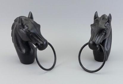 PAIR OF CAST IRON HORSE-FORM HITCHING POST TOPPERS Early 20th Century Heights 9".