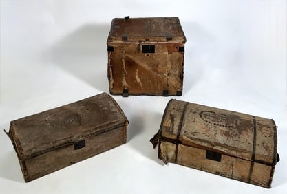 THREE HIDE-COVERED TRUNKS 19th Century Lengths from 27" to 30".