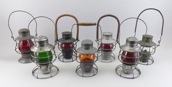 SEVEN RAILROAD LANTERNS Late 19th Century Heights 11".