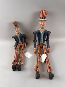 PAIR OF CARVED WOODEN UNCLE SAMS Late 20th Century Heights 18" and 23".