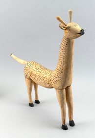 FOLK ART CARVED WOODEN GIRAFFE 20th Century Height 20". Length 19".