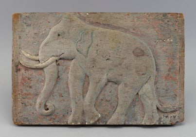 RELIEF-CARVED PANEL DEPICTING AN ELEPHANT Early 20th Century 11.25" x 17".