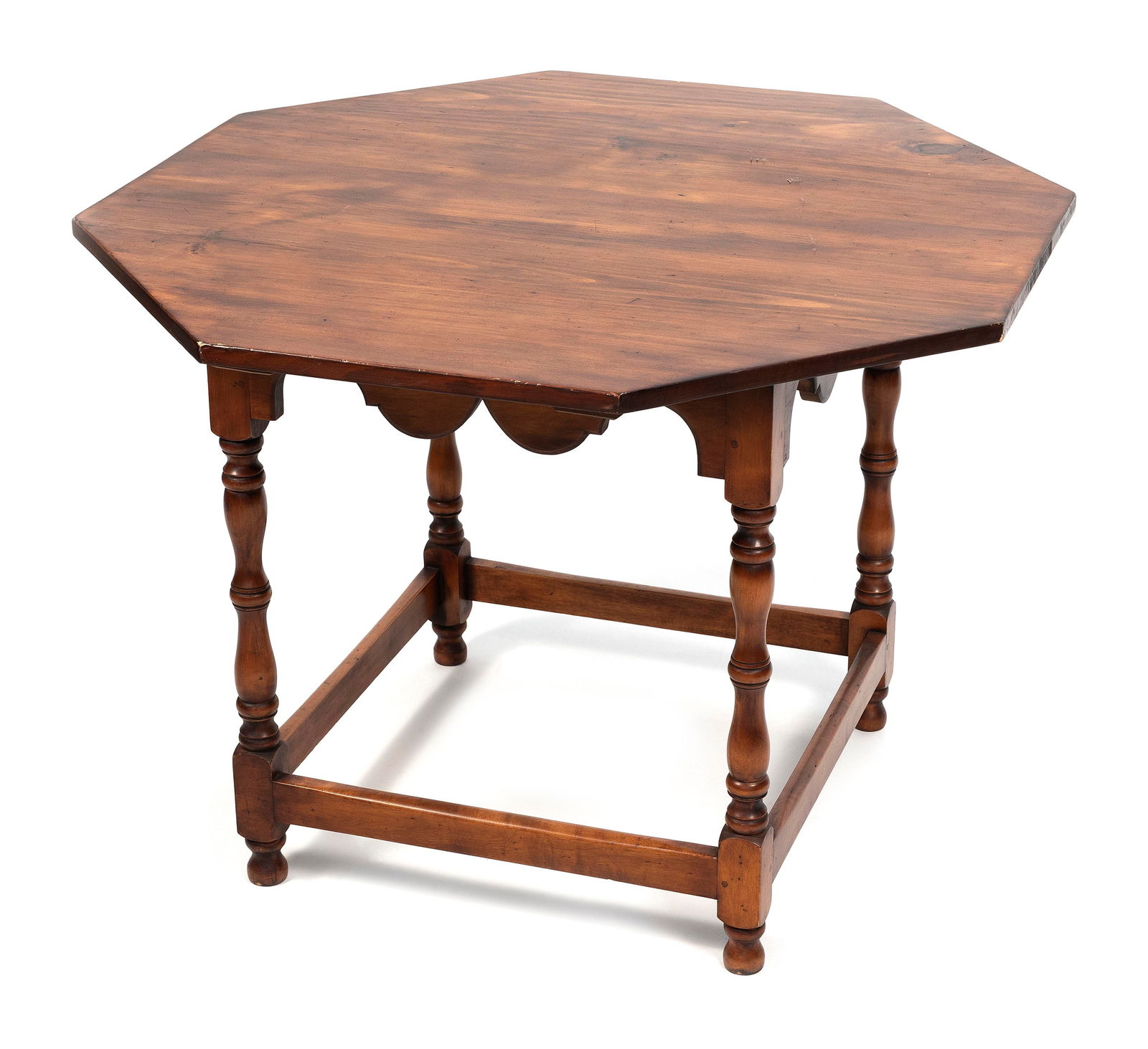 ELDRED WHEELER MAPLE AND PINE BREAKFAST TABLE Massachusetts, 20th Century Height 27". Length 36".: ELDRED WHEELER MAPLE AND PINE BREAKFAST TABLEMassachusetts, 20th CenturyWith an octagonal top, stretcher base and knob feet. Eldred Wheeler paper label and stamp on underside of top.Height 27". Length