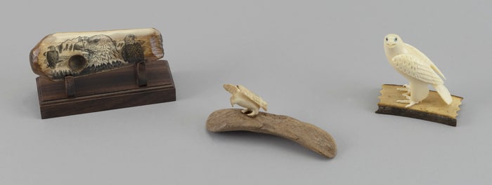 THREE ESKIMO IVORY CARVINGS 20th Century Lengths from 3.25" to 4.75".