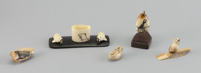 FIVE ESKIMO CARVINGS, MOSTLY FOSSILIZED WALRUS IVORY 20th Century Heights from 1" to 4.75".