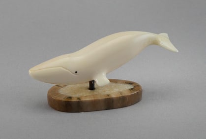 CARVED FOSSILIZED IVORY WHALE BY MELVIN SEPPILU 20th Century Length 3".
