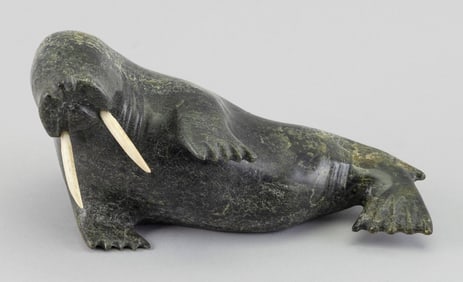 INUIT CARVED SOAPSTONE WALRUS Iqaluit, Frobisher Bay, Nunavut, 20th Century Height 4.5". Length