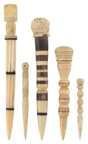 FIVE CARVED WHALEBONE AND WHALE IVORY BODKINS 19th Century Lengths from 2.75" to 6.25".