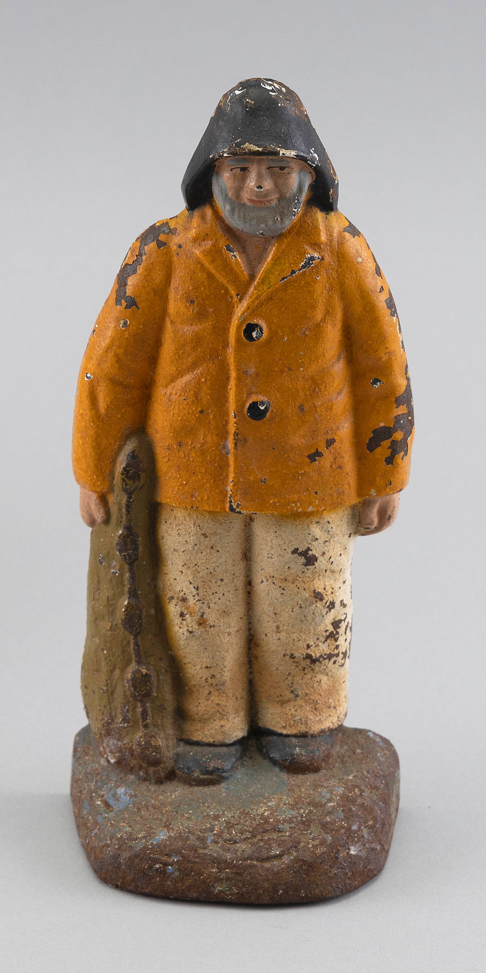 CAST IRON "OLD SALT" DOORSTOP 20th Century Height 7.5". Width 3.5".: CAST IRON "OLD SALT" DOORSTOP20th CenturyFlat-back style. Original paint.Height 7.5". Width 3.5".