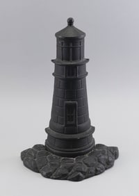 CAST IRON LIGHTHOUSE DOORSTOP Circa 1930 Height 14". Width 9.25".