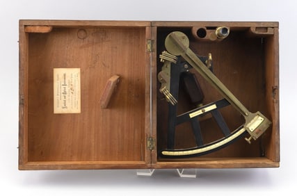 CASED W. & W.G. BLUNT BRASS AND EBONY SEXTANT 19th Century Height 5.25". Width 13". Depth 11.25".