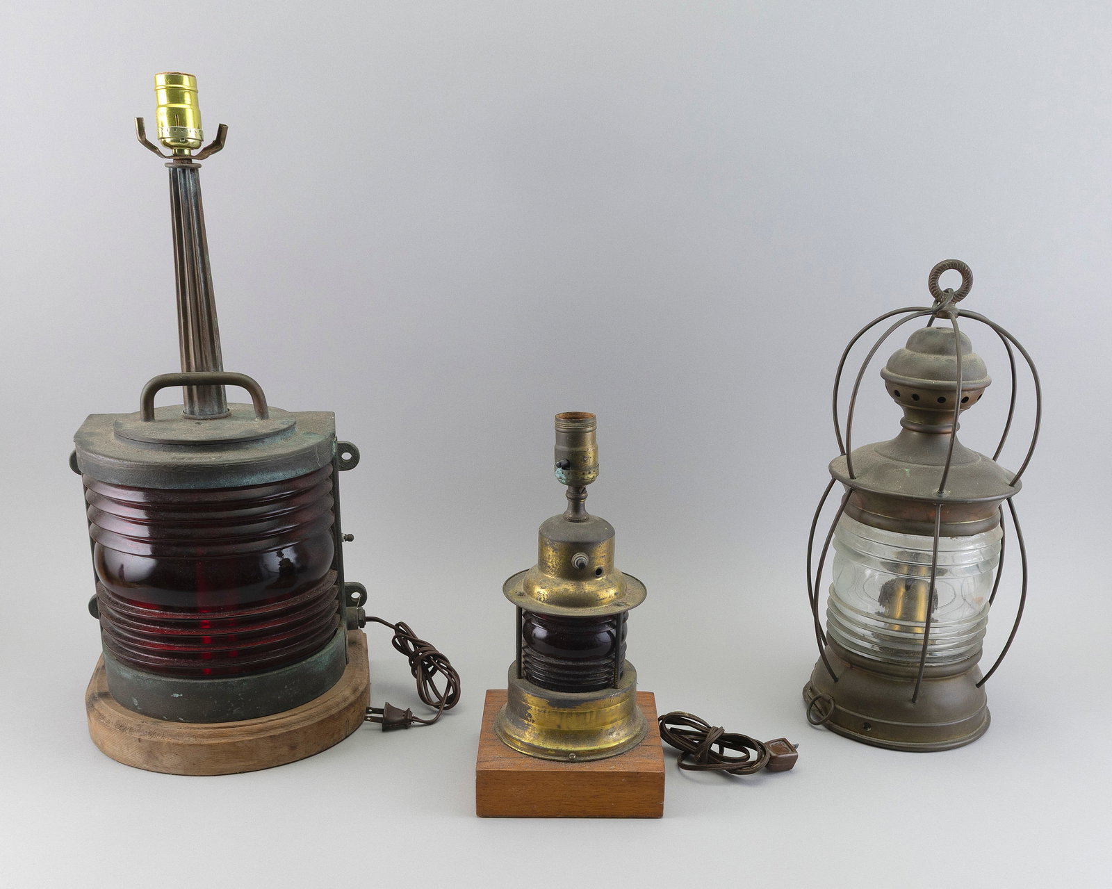THREE MARINE LANTERNS 19th/Early 20th Century Heights from 12.5" to 22".: THREE MARINE LANTERNS 19th/Early 20th Century One port, one starboard and one masthead. Heights from 12.5" to 22".
