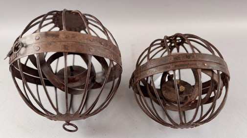 PAIR OF WROUGHT IRON GIMBALED SHIP'S LANTERNS 20th Century Heights 8" and 9".