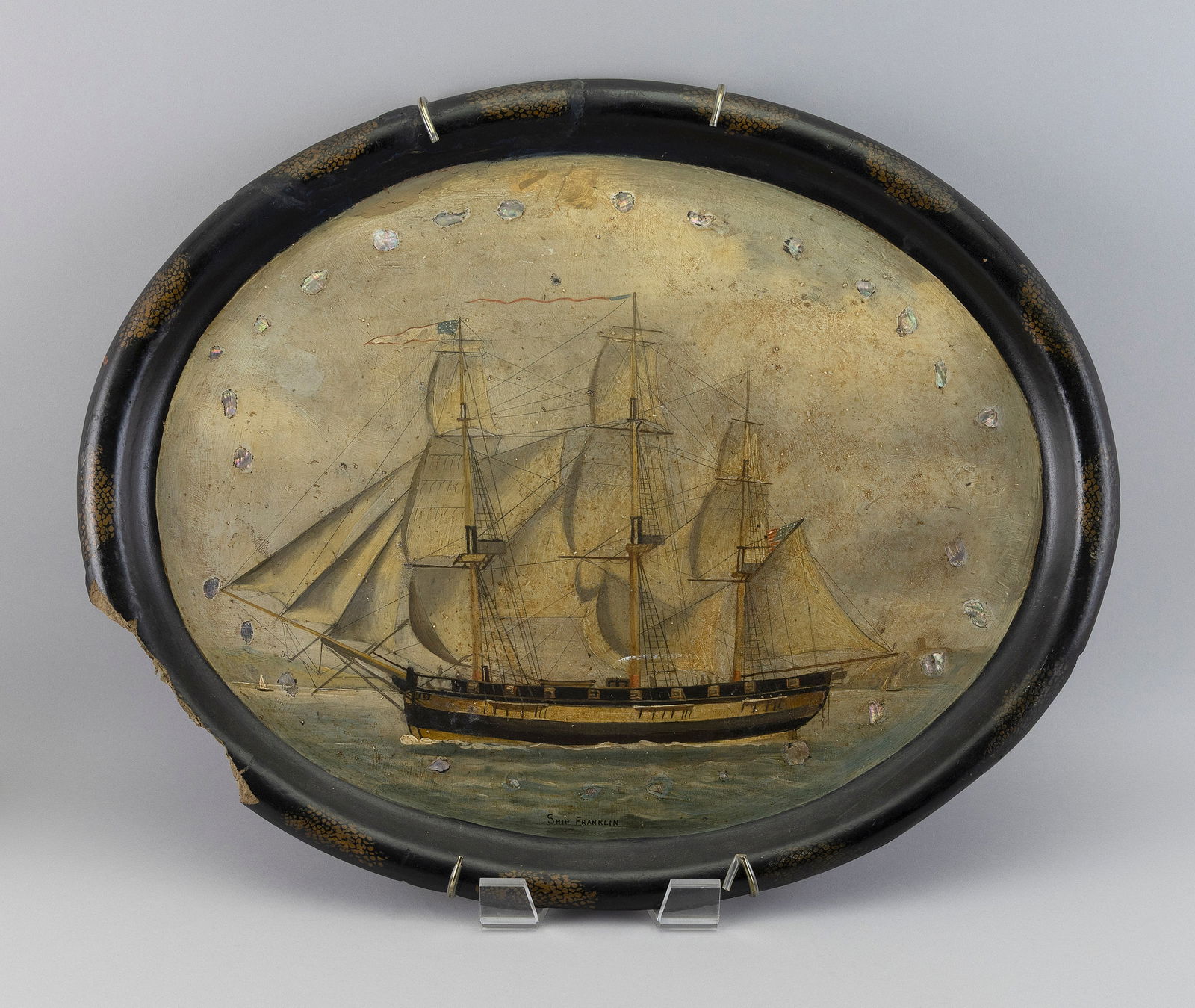 OVAL PAPIER-MACHE TRAY WITH SHIP DECORATION 20th Century Length 24".: OVAL PAPIER-MACHE TRAY WITH SHIP DECORATION20th CenturyTitled "Ship Franklin" on lower edge. Mother-of-pearl inlay around perimeter.Length 24".