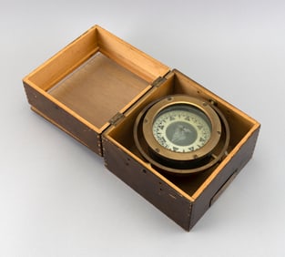 CASED BRASS BERGEN NAUTIK BUBBLE COMPASS Norway, 20th Century Case height 7". Width 8". Depth 8".