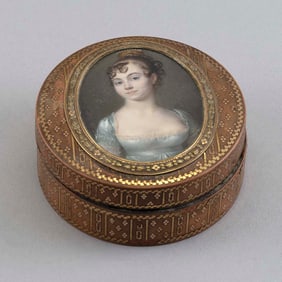 JEAN BAPTISTE JACQUES AUGUSTIN (France, 1759-1832), Oval miniature portrait of a young lady wearing