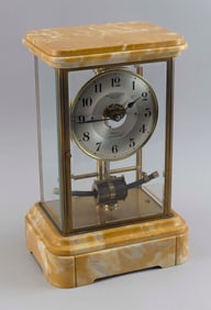 BRASS AND MARBLE MANTEL CLOCK BY BULLE France, 20th Century Height 14.5". Width 9.5". Depth 7".