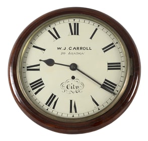 ENGLISH WALL CLOCK RETAILED BY W.J. CARROLL Circa 1870-1890 Height 14.75". Width 14.75". Depth 6".