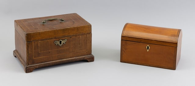 TWO ENGLISH TEA CADDIES England, Early 19th Century Heights to 5.25". Widths to 8.75". Depths to