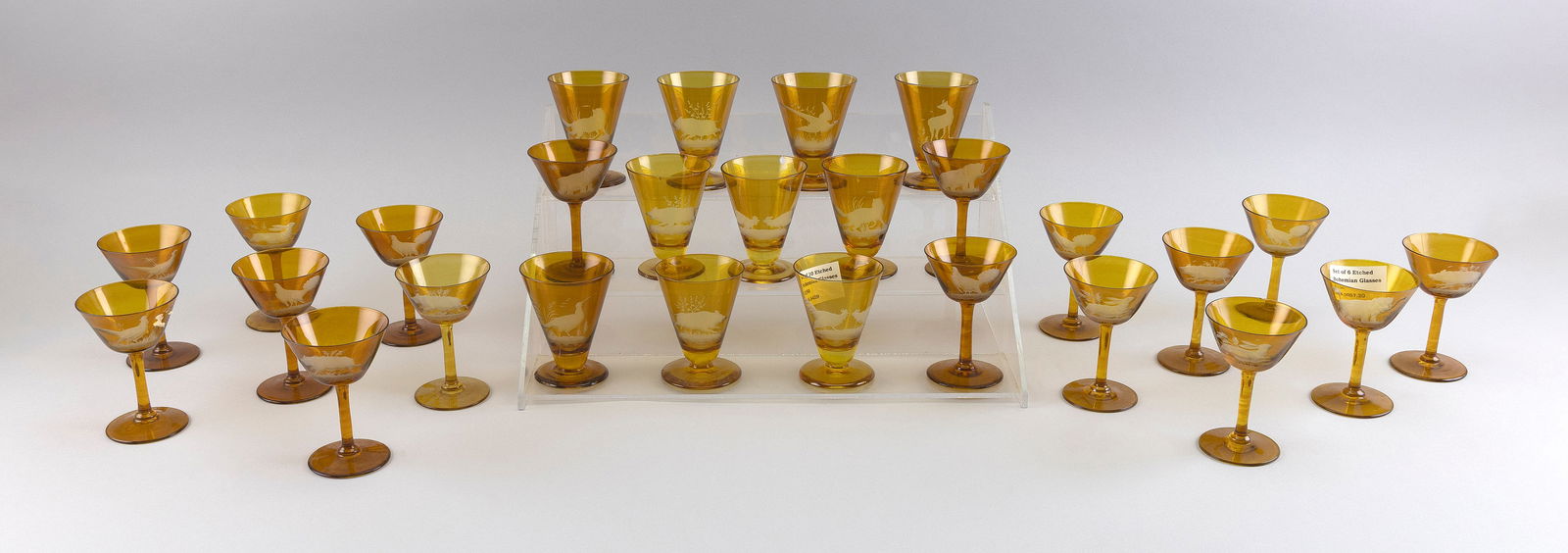 SET OF TWENTY-SEVEN BOHEMIAN AMBER ETCHED GLASSES Early 20th Century (1 of 1)