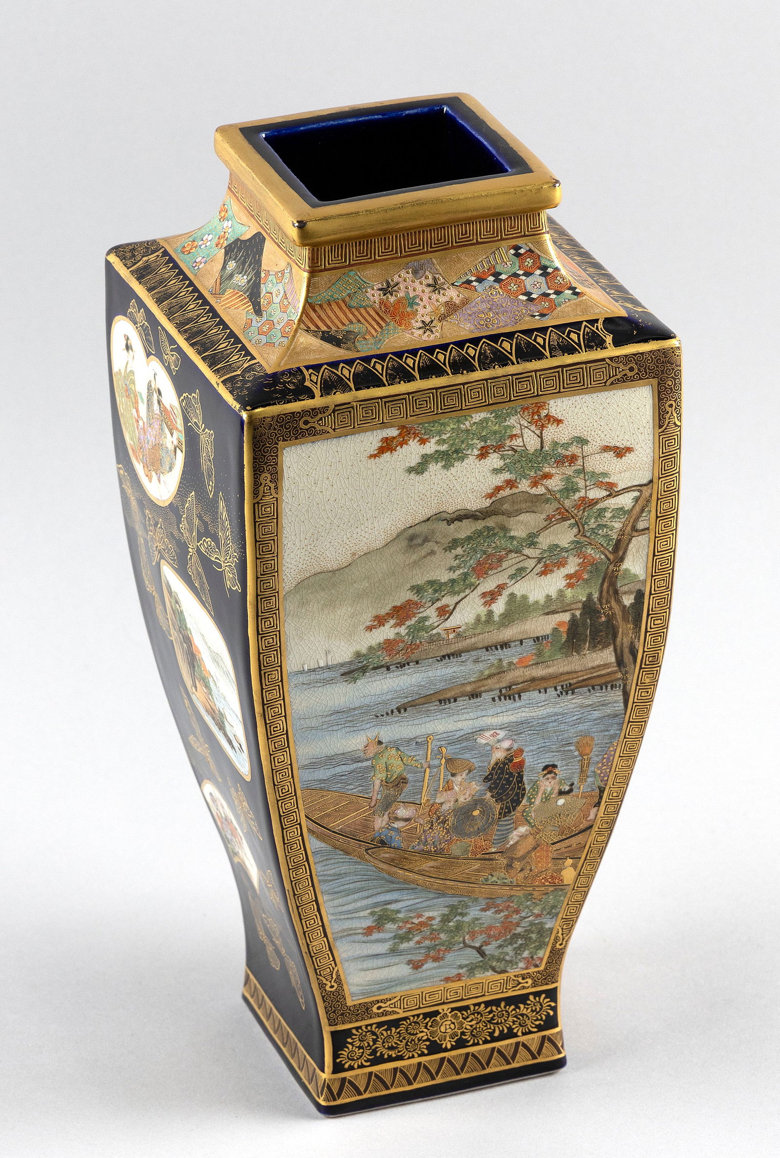 JAPANESE GOSSU BLUE SATSUMA PORCELAIN VASE Meiji Period, Circa 1900 Height 12". Width 5.25". (1 of 5)