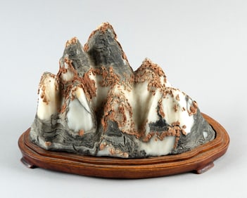 CHINESE WHITE AND GRAY SCHOLAR'S STONE 19th Century Height 7". Length 11". With a fitted wooden