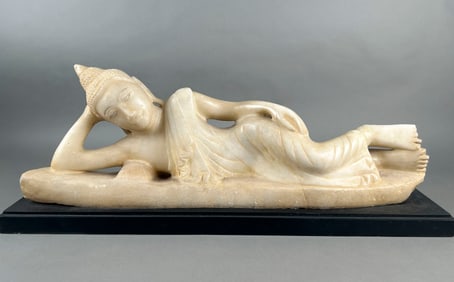 BURMESE CARVED MARBLE RECLINING BUDDHA Mandalay Period, 18th/19th Century Height 9.5". Length 26".