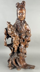 CHINESE CARVED ROOTWOOD FIGURE OF GUANYIN Late 19th Century Height 27".