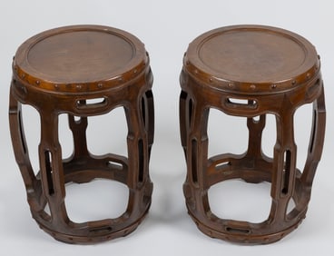 PAIR OF CHINESE CARVED WOOD GARDEN STOOLS Late 19th/Early 20th Century Heights 19.5". Top diameters
