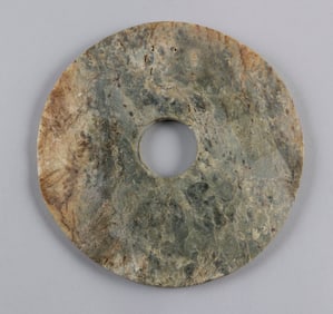 CHINESE MOTTLED GREEN AND BROWN JADE BI 18th Century Diameter 8".