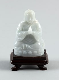 CHINESE CARVED JADE FIGURE OF GUANYIN 19th Century Height 3.5". With a fitted wooden stand.