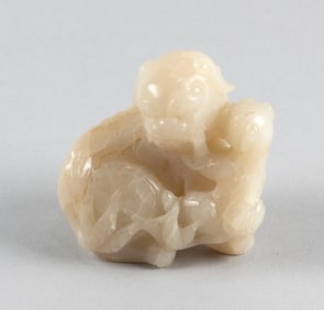 CHINESE CARVED WHITE NEPHRITE JADE FU DOG 18th Century Height 3.5". Length 3".