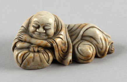 CHINESE CARVED WHITE HARDSTONE FIGURE OF A SLEEPING HOTEI 19th Century Length 4".
