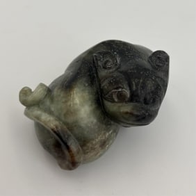 CHINESE CARVED MOTTLED GREEN AND BLACK JADE DOG Late 19th Century Length 2.5".