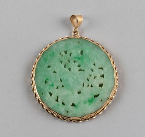 CHINESE OPEN-CARVED CELADON JADE PENDANT Diameter 2".