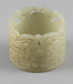 CHINESE CARVED LIGHT CELADON JADE CYLINDRICAL STAND 18th Century Height 2". Diameter 2.25".