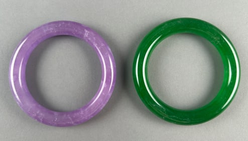 TWO CHINESE JADE BANGLES Diameters 3" and 3.25".
