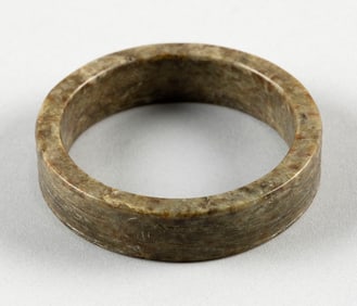 CHINESE ARCHAIC MOTTLED BROWN JADE BANGLE OR CIRCLET Possibly Sung Dynasty Height 1". Diameter 3.5".