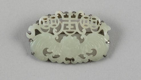 CHINESE OPEN-CARVED WHITE JADE PLAQUE Late 19th/Early 20th Century Length 2".