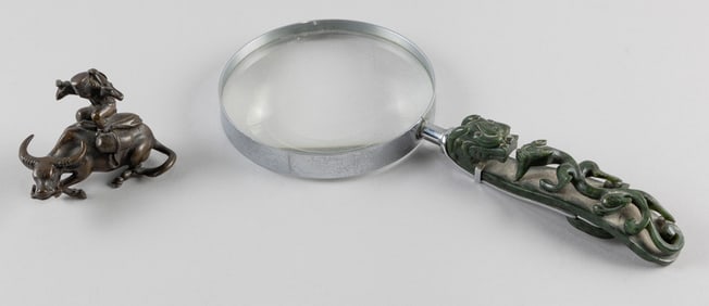 CHINESE GREEN JADE GIRDLE HOOK AND BRONZE FIGURE GROUP Late 19th Century Hook length 5.5".