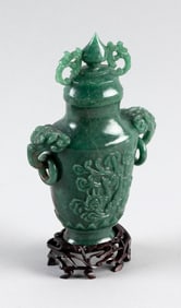 CHINESE CARVED GREEN JADEITE COVERED VASE 19th Century Height 7.5". With wooden stand.