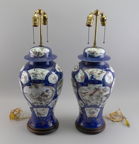 PAIR OF CHINESE FAMILLE ROSE PORCELAIN BALUSTER VASES Late 19th Century Vase heights 20". Total