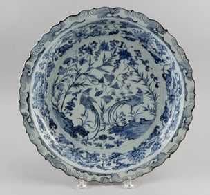 CHINESE UNDERGLAZE BLUE AND WHITE PORCELAIN CHARGER Yunlong, 19th Century Diameter 15.5".